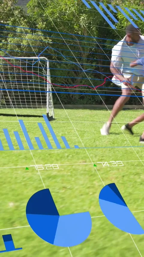 Vertical video: Right entry starting play, man and boy training shots toward Stock Footage 333236616