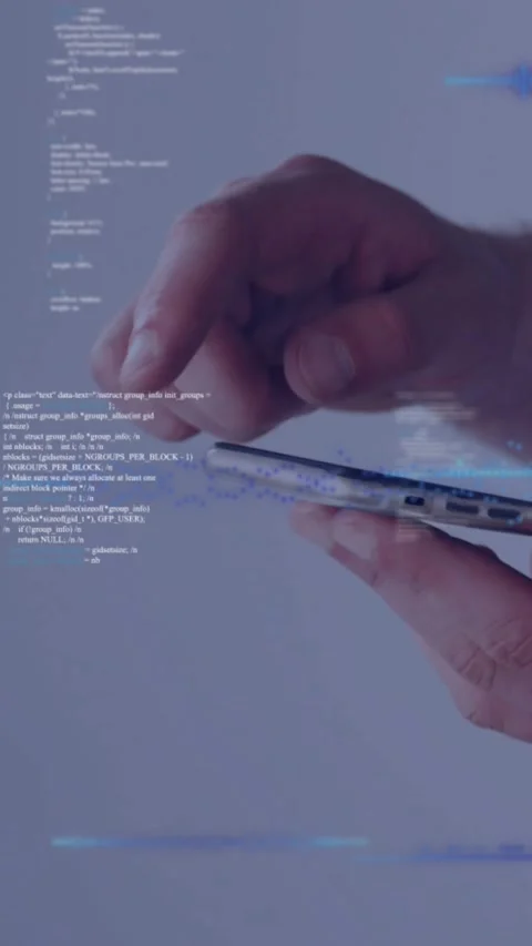 Vertical video: Right hand tapping phone, generating code overlays and blue Stock Footage 328633207