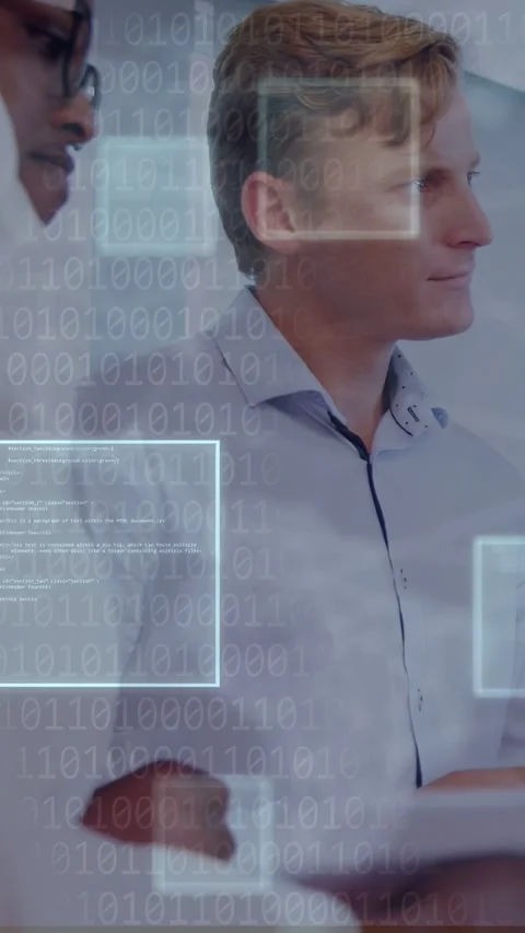 Vertical video: Right man and peer watching demo starting, tech UI panels Stock Footage 334770670