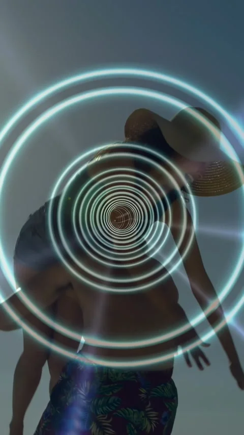 Vertical video: Rings aligning over heads sparking lift silhouetted pair lifting Vídeo Stock 330359388