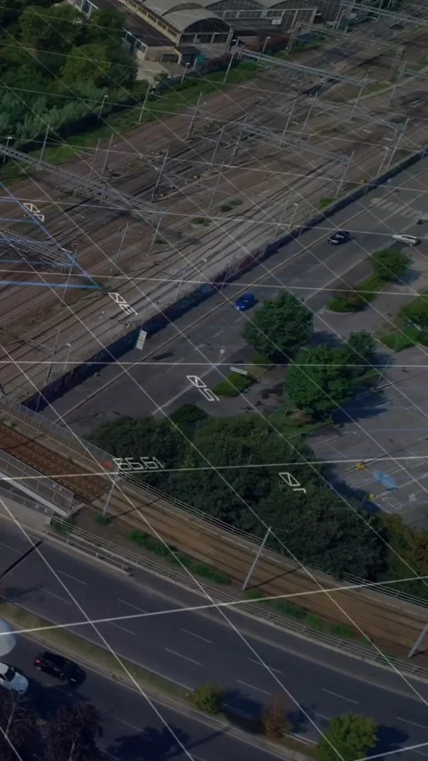 Vertical video: Road-rail overlays shifting after camera tilt while cars, truck Stock Footage 329934530