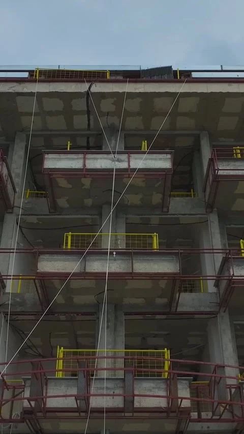 Vertical Video Rooftop Worksite with Construction Materials Stock Footage 341889406
