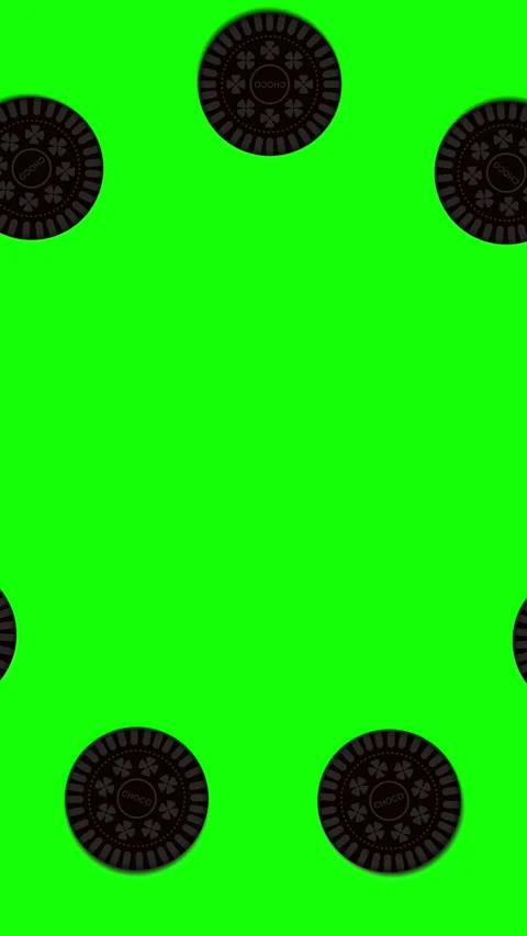 Vertical Video of Rotating Chocolate Cookies on Green Screen Stock Footage 346418861