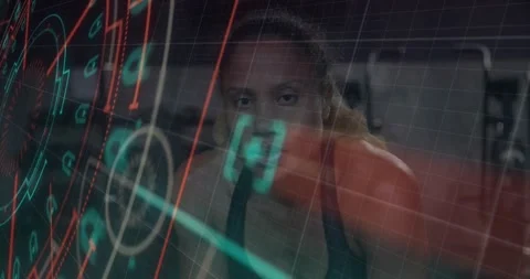 Vertical video: Rotating HUD crossing camera in gym, woman holding steady in Stock Footage 330741644