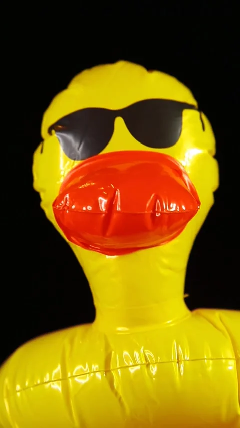 Vertical video of rubber duck dark background Stock Footage 241722730