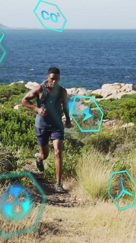 Vertical video: Runner starting coast trail closing toward camera striding AR Stock Footage 334598715