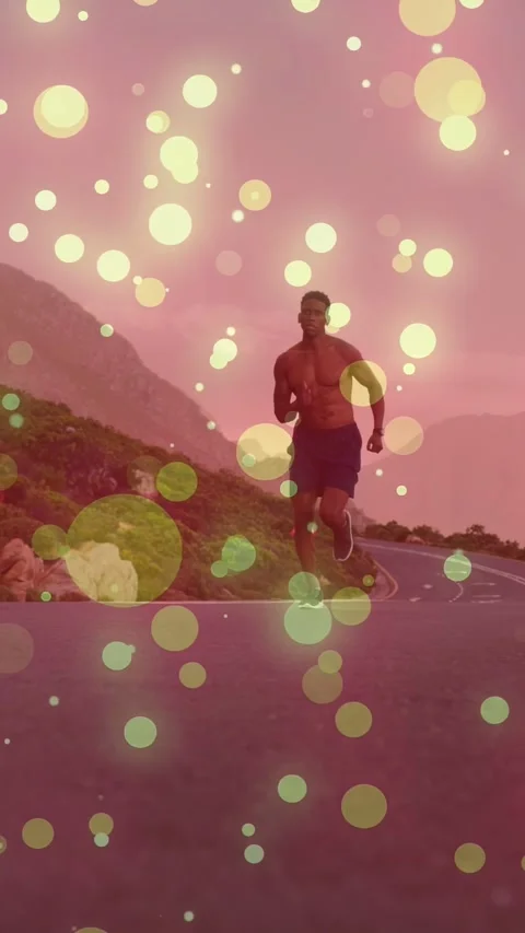 Vertical video: Runner starting at curve, running toward cam for fitness, bokeh Stock Footage 333496698