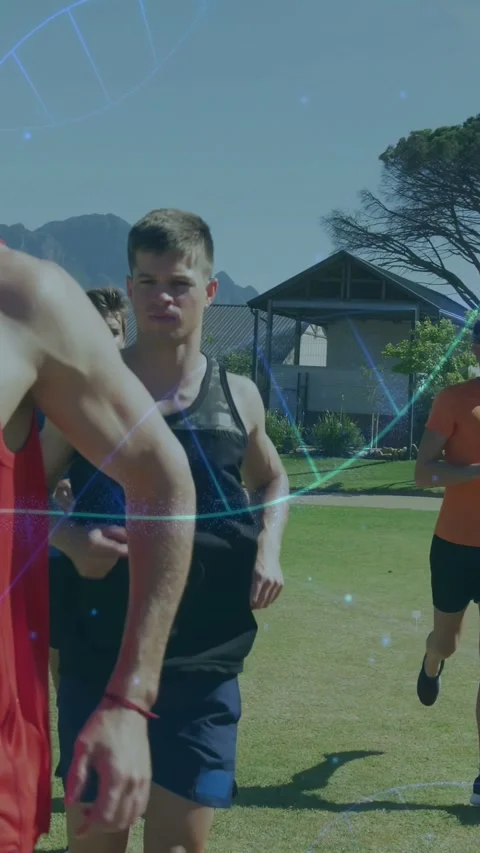 Vertical video: Running group starting drill, running toward cam on lawn, blue Stock Footage 340133429