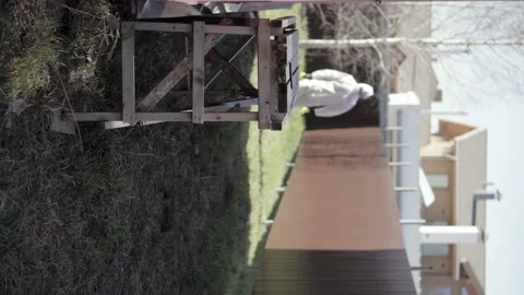 Vertical video sanitizer man goes smartphone says coronavirus general plan Stock Footage 130436276