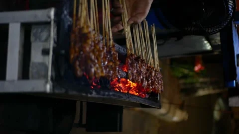 Vertical video of Sate or satay, traditional food from Indonesia is being g.. Stock Footage 294281305