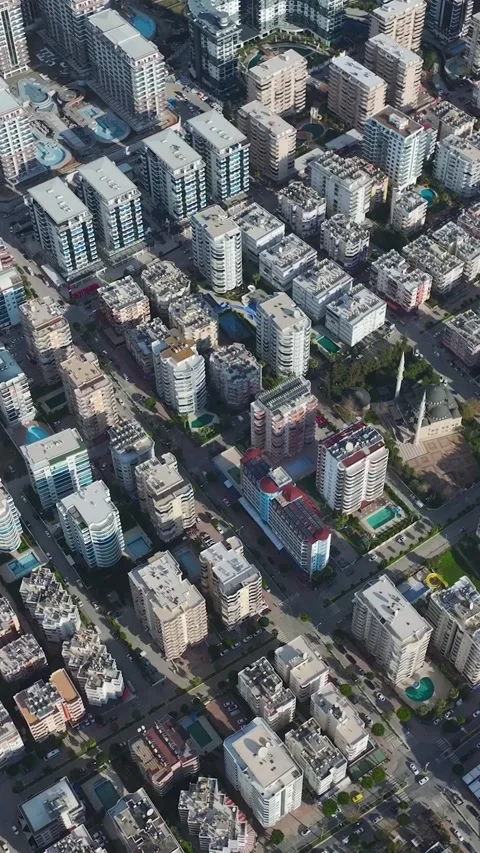 Vertical Video: Scenic Aerial View of a Cityscape by the Ocean With Modern Stock Footage 342654688