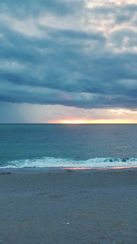 Vertical Video: Scenic Cloudy Sky at Sunset Overlooking the City and Ocean Video stock 342562794