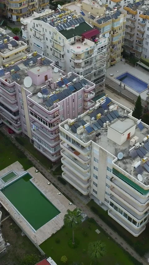 Vertical Video: Scenic View of Urban Buildings Overlooking the Ocean and Blue Stock Footage 342900492