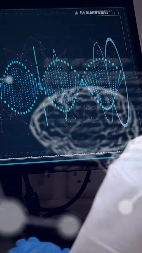 Vertical video: Scientist viewing screen as tech shifting code into brain Stock Footage 330604942