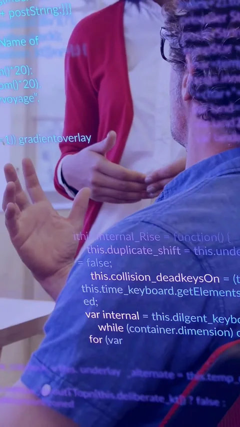 Vertical video: Seated man gesturing while woman pointing and leaning, reviewing Stock Footage 334187566