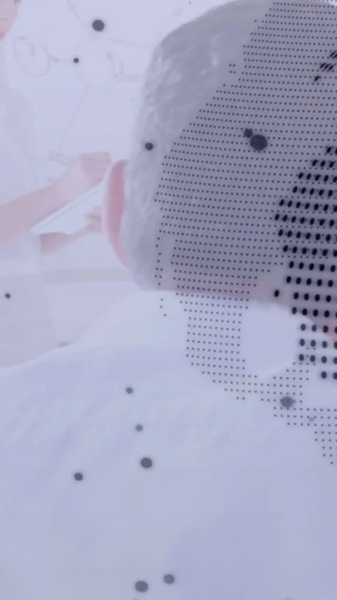 Vertical video: Seated man getting ear exam while staff moving tool and code Stock Footage 334544310