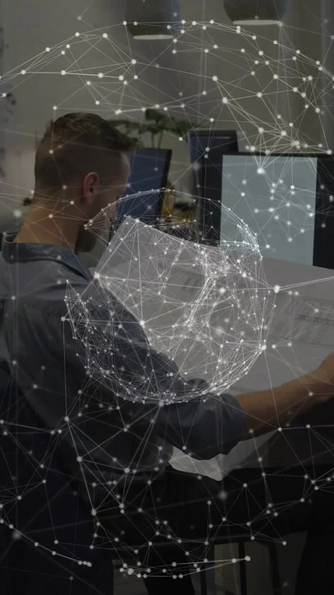 Vertical video: Seated man reading plan woman leaning and pointing for tech, Stock Footage 331166787