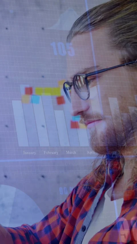 Vertical video: Seated man tapping tab and causing data charts over notes wall Stock Footage 335513212