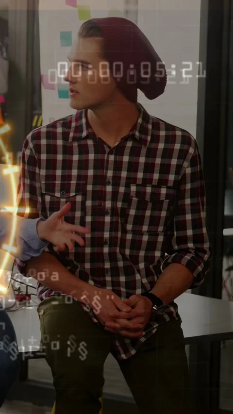 Vertical video: Seated man turning to speaker gesturing easing hands attending Video stock 333542301