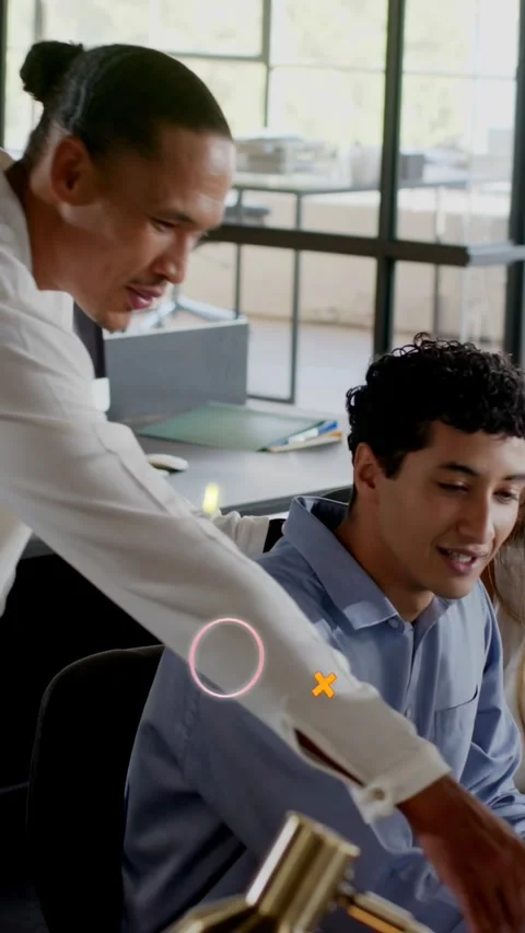 Vertical video: Seated man typing at tech desk graphics over monitor senior Stock Footage 333953447
