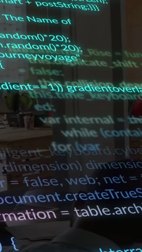 Vertical video: Seated man working on laptop debugging code, tech text scrolling Stock Footage 331238563