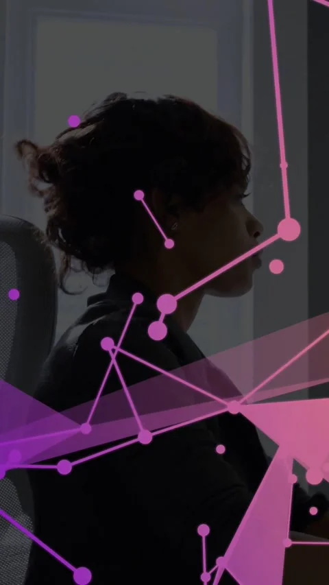 Vertical video: Seated person typing, initiating AR technology, pink or purple Stock Footage 331178309