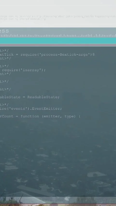 Vertical video: Second frame editor overlay appearing, filling with code to Stock Footage 329612888