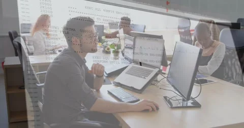 Vertical video: Seeing code overlay fading, man in dark shirt at office Stock Footage 331736178