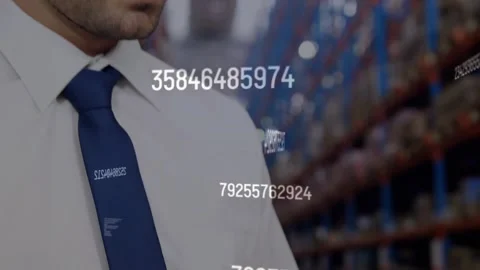 Vertical video: Seeing data appearing, man white shirt tie using tablet at Stock Footage 332404905