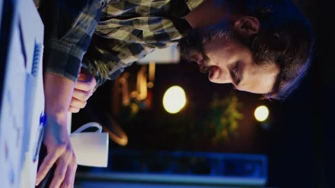 Vertical video Self employed developer updating AI machine learning algorithm Video stock 263782744