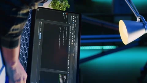 Vertical video Self employed IT specialist working on fixing database errors 動画素材 264124916