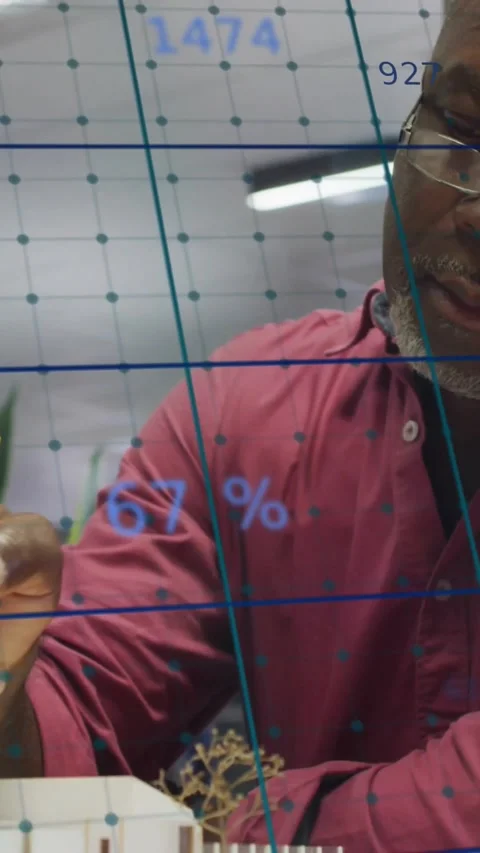 Vertical video: Senior man leaning marking model with pencil while grid data Stock Footage 334319153
