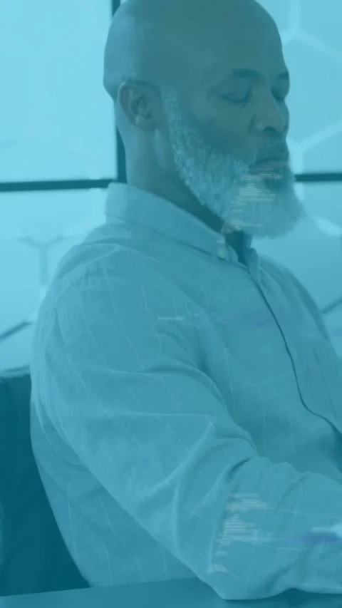 Vertical video: Senior man putting mug down then tapping tablet, viewing tech Stock Footage 334546632