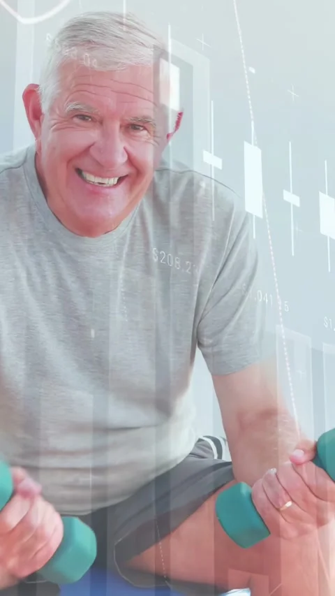 Vertical video: Senior man smiling at camera and curling teal weights for Stock Footage 332317317