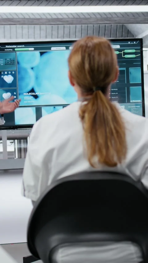 Vertical video Senior scientist in lab presents innovative DNA sequencing Stock Footage 326830200
