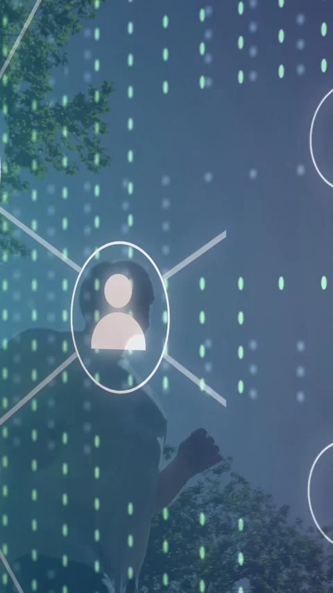 Vertical video: Senior standing under tree user fading in sparking IT net above Stock Footage 333744963