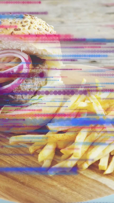 Vertical video: On sequence start, glitch bands sweeping across burger and Stock Footage 333721147