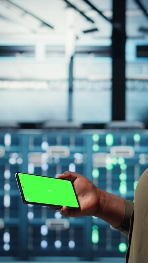 Vertical video Server hub admin uses isolated screen smartphone to watch video Stock Footage 317054009