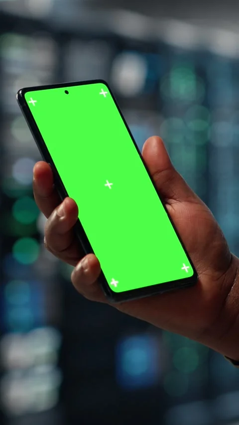 Vertical video Server hub software developer uses green screen smartphone Stock Footage 317054870