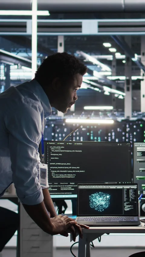 Vertical video Server hub team leader and worker using node tree software to Video stock 307970845