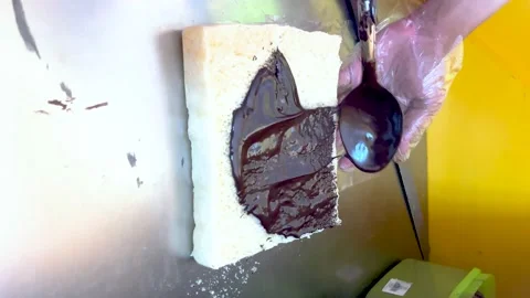 Vertical video serving Roti Gembong Gedhe, Indonesian bread Stock Footage 235790278