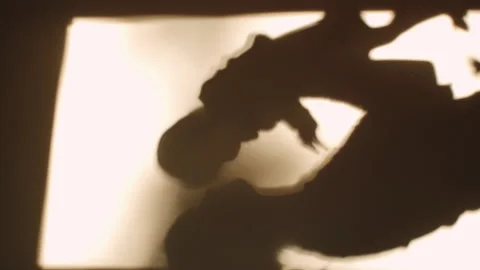 Vertical video of shadow unknown caring young mother holding little baby son Stock Footage 263804597