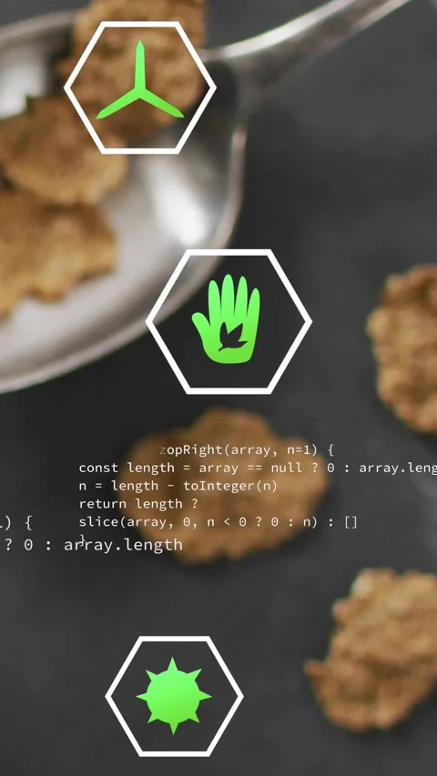 Vertical video: Shifting green hex icons over metal spoon on slate causing code Stock Footage 330655642