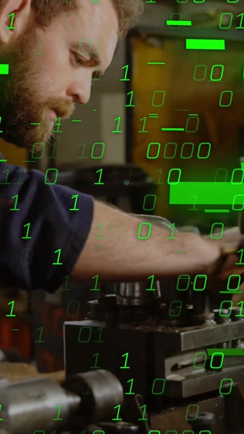 Vertical video: Shop tech grabbing lever, adjusting tooling for CNC setup with Stock Footage 330581222