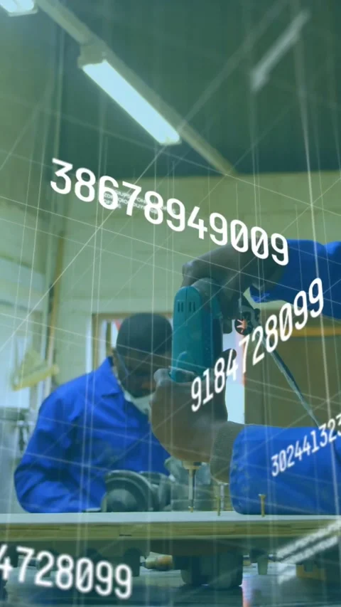 Vertical video: Shop tech starting drill, drilling part in vise for fit as peer Stock Footage 331128839