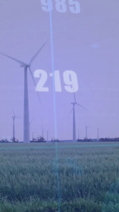 Vertical video: Showing output, overlay fading in, turbines in plain rotating Stockbeeldmateriaal 332317472