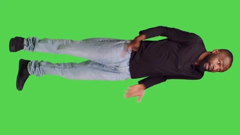 Vertical video: Side view of angry person having argument with someone on camera Stock Footage 236896658
