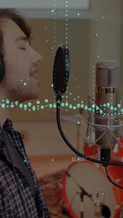 Vertical video: Singer starting, singing, leaning pop filter, teal wave tracking Stock Footage 328221504