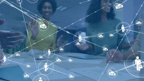 Vertical video: Single icon popping business team checking docs at table to Stock Footage 331634260