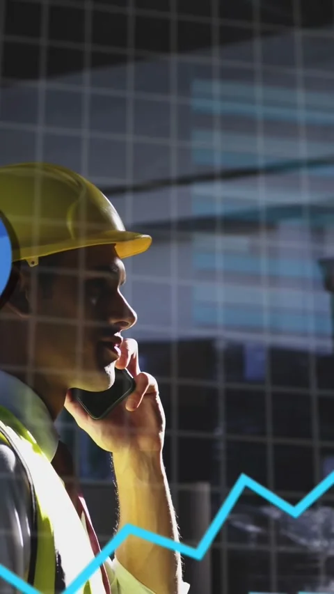 Vertical video: Site manager lifting phone checking data while bar chart and Stock Footage 334377556